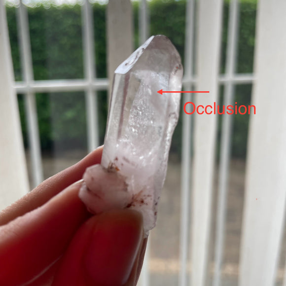 Clear Quartz Point with occlusion 2