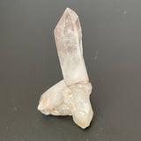 Chisel tip Quartz Point with striations and occlusion 5