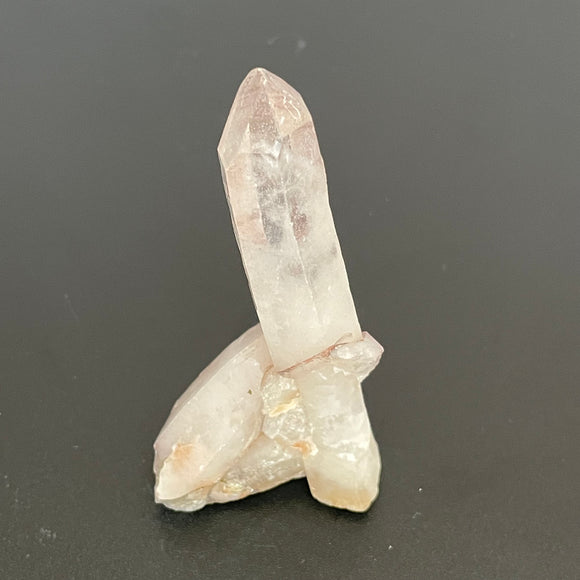 Chisel tip Quartz Point with striations and occlusion 5